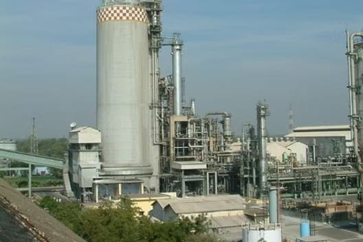 A fertilizer plant with a prilling tower and process units